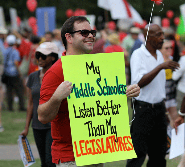 An "educator" at the final Moral Monday protest. (Photo by Don Carrington)